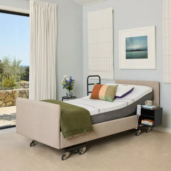 Modern bedroom with adjustable bed, nightstands, and decor
