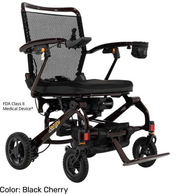 Black cherry color electric wheelchair on a white background